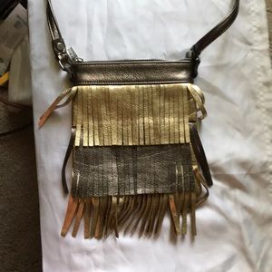 Fringed gold and bronze crossbody purse